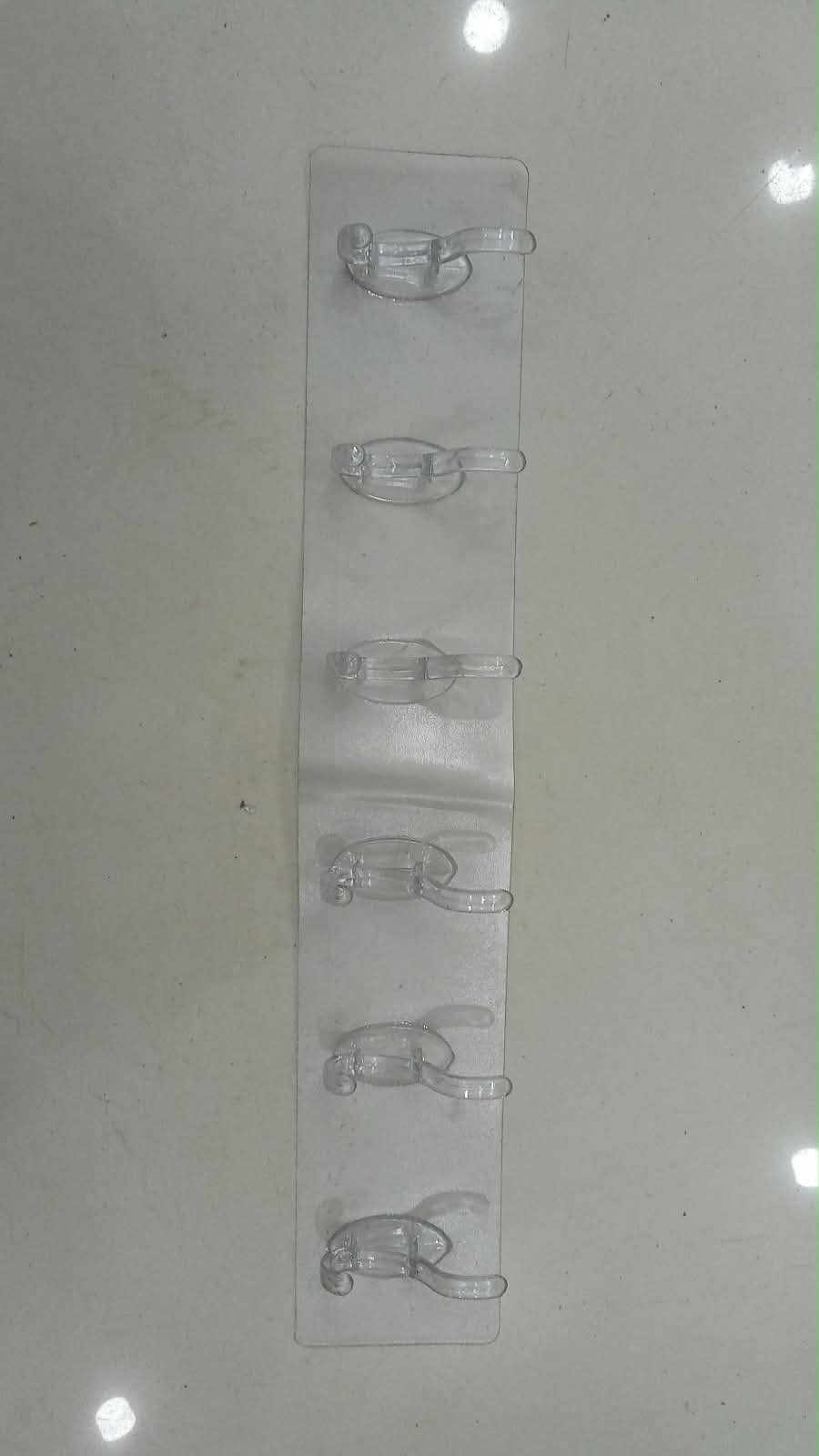 Adhesive 6-Hook Wall Hanger - Perfect for kitchens Bathrooms or Bedrooms Pack of 4